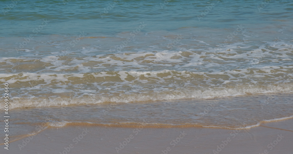 Sea wave over the beach