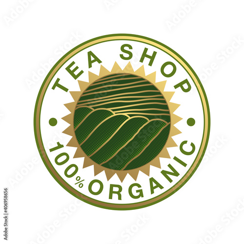 Logo rond vert et or pour du thé biologique avec au centre un champ de thé dans un soleil. 