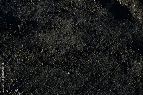 Black soil close-up. The concept of agriculture and the spring season. photo