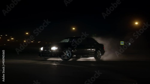 Sports car spinning in drift photo
