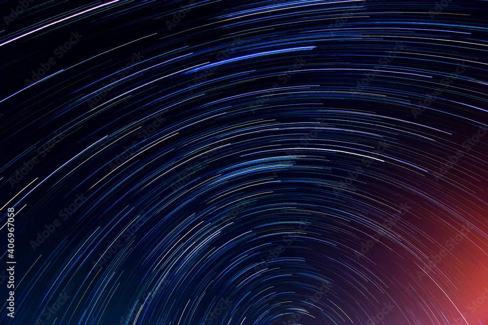 Abstract blur of Light trals star orbit on sky for background