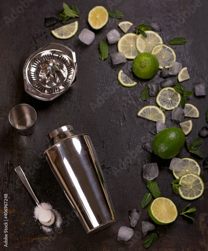 Bar accessories and ingredients for cocktail drink lime, mint, ice