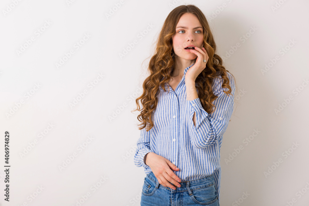 portrait of curly pretty young woman with blond culry long hair portrait of curly pretty young woman with blond culry long hair