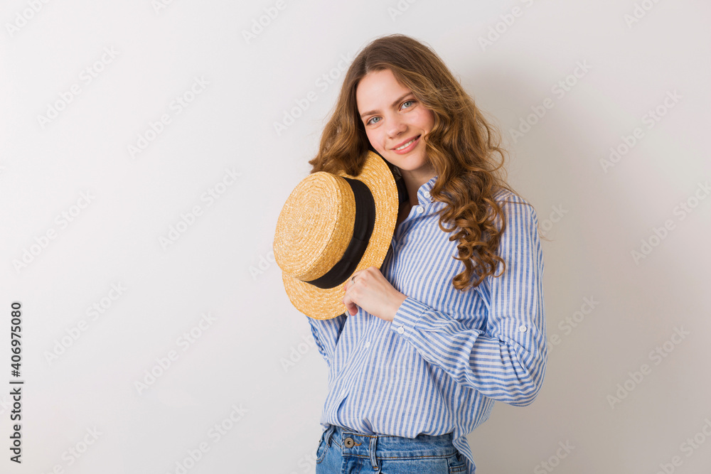 portrait of young pretty woman with straw hat jeans blue cotton shirt portrait of young pretty woman with straw hat jeans blue cotton shirt