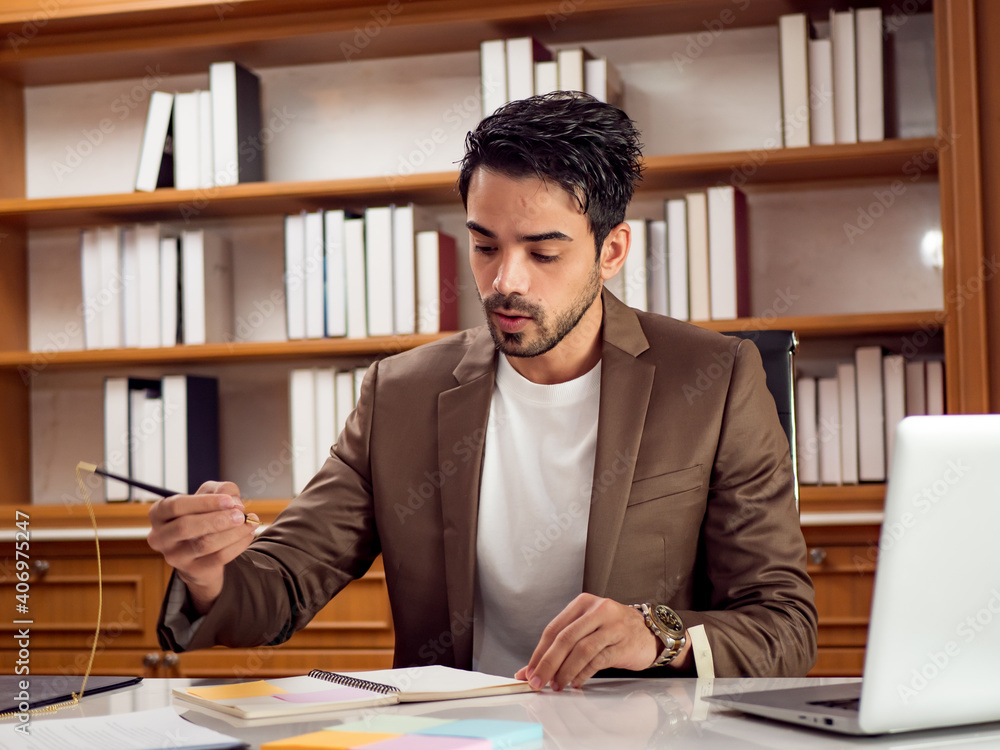 Portrait of businessman working in the office Portrait of businessman working in the office
