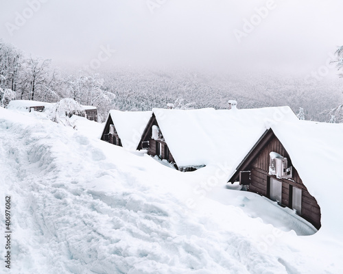 snow covered house in the mountains