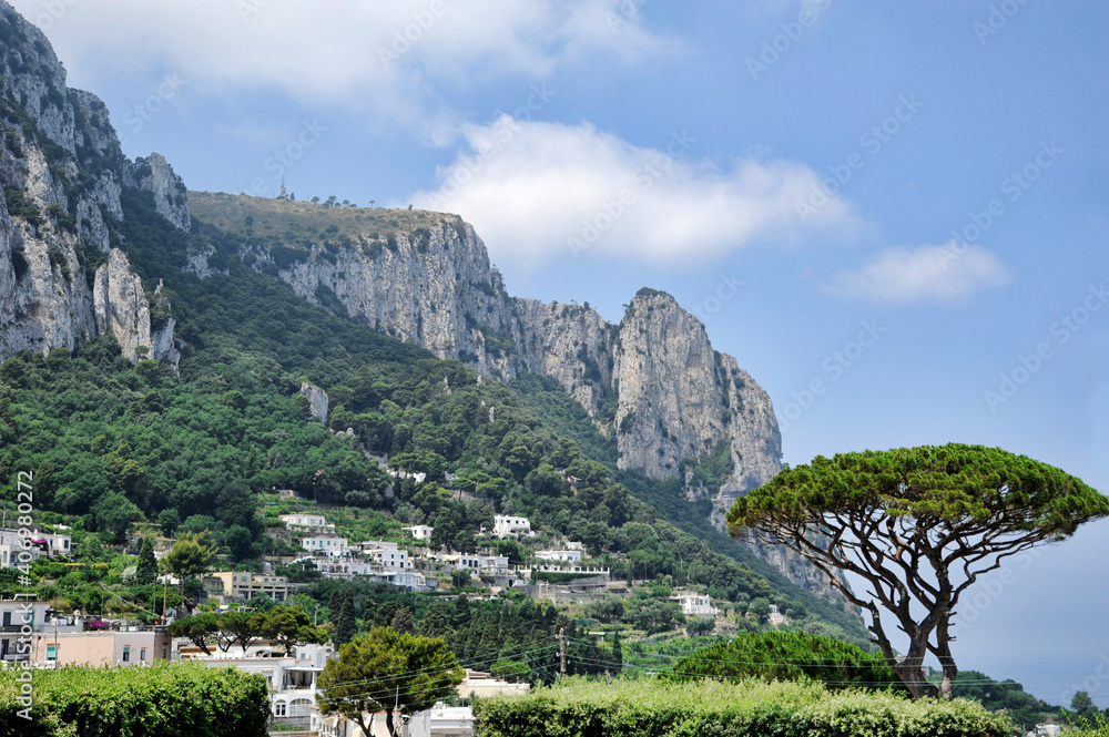 Amazing views towards hills and villages in Capri island, Gulf of Naples, Tyrrhenian Sea, Italy, travel destination attracting tourists for its natural beauty, delicious cuisine and expensive shopping