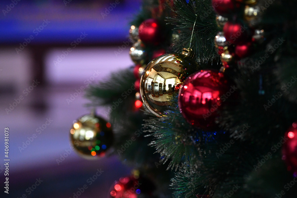 Fototapeta premium christmas, tree, decoration, holiday, ball, ornament, celebration, xmas, red, christmas tree, winter, green, new, year, bauble, lights, season, gift, light, festive, december, gold, fir, pine, seasona