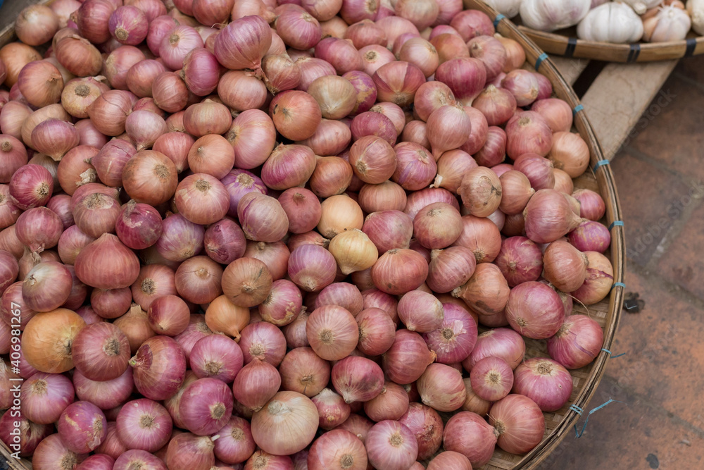Shallots. Fresh purple shallots on bamboo basket. Shallots. Fresh purple shallots on bamboo basket.