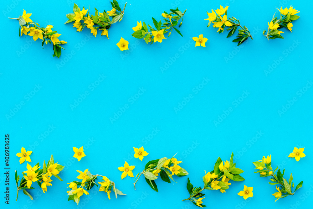 Flowers pattern. Flat lay of yellow flowers with leaves, top view Flowers pattern. Flat lay of yellow flowers with leaves, top view