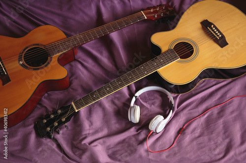 Two classic guitar in bed