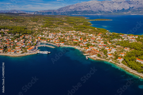 SUMARTIN, CROATIA - august 2020: Aerial drone panorama of the quiet harbor, Brac Island east side on a summer morning.