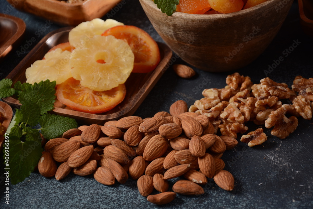 Mix of dried and sun-dried fruits, in a wooden trays . View from above. Symbols of the Jewish holiday of Tu BiShvat Mix of dried and sun-dried fruits, in a wooden trays . View from above. Symbols of the Jewish holiday of Tu BiShvat