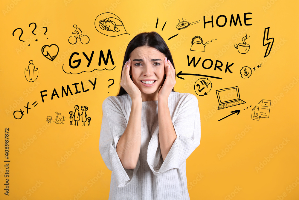 Fototapeta premium Stressed young woman, text and drawings on yellow background