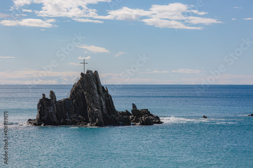 View of Asseu rock in Riva Trigoso. Winter sea on ligurian coast. photo