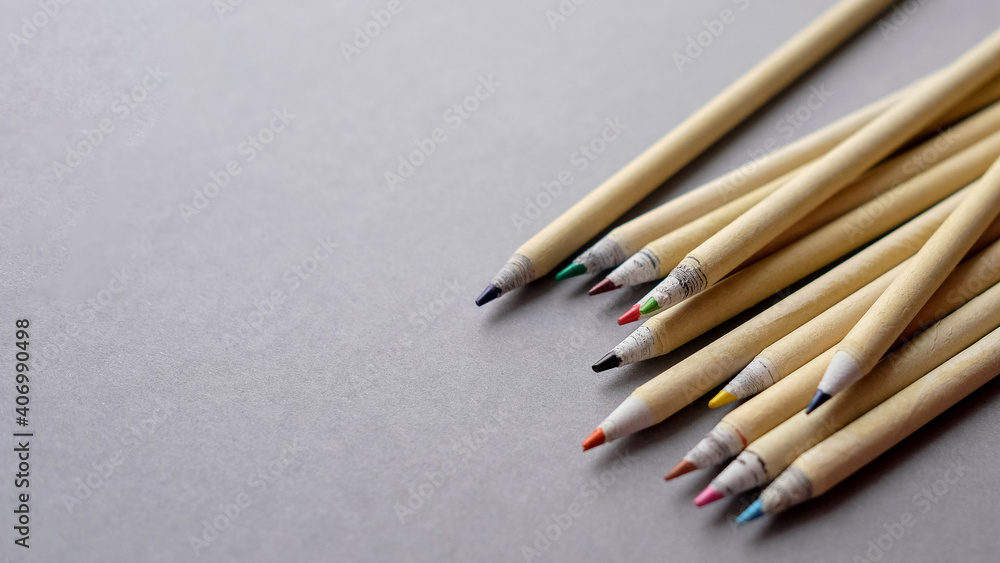 Pencils made of eco-friendly materials lie on a gray background Pencils made of eco-friendly materials lie on a gray background