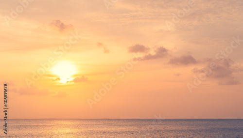 Sunset sky over sea in the evening with colorful orange sunlight and sundown landscapes,Dusk sky.  © Nature Peaceful 