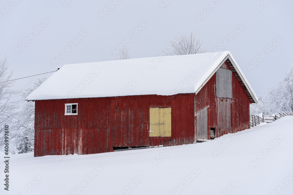 Abandoned red barn in the snow. Abandoned red barn in the snow.