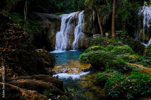 Paradise waterfall in deep forest turquoise water