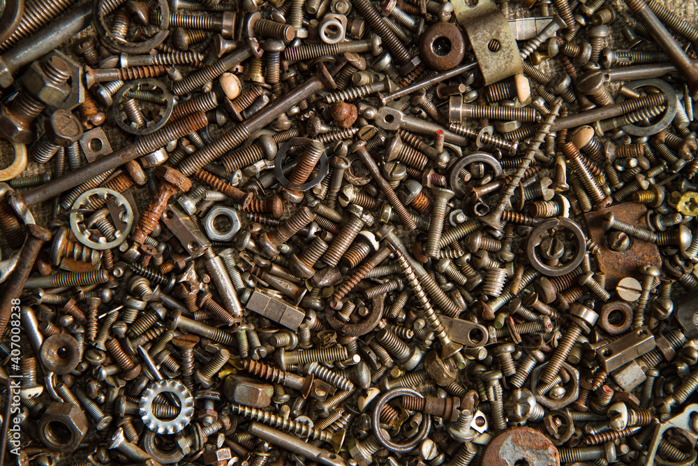 Industrial background texture. Bolts nuts washers screws and other small parts were used. Industrial background texture. Bolts nuts washers screws and other small parts were used.