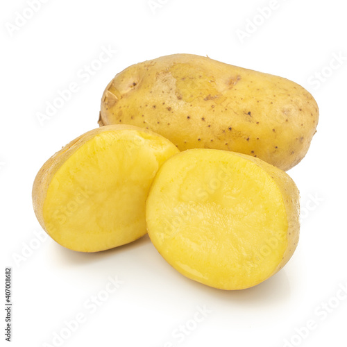 Fresh potato or potato slices (Solanum tuberosum) isolated on white background
