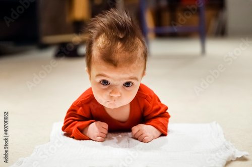 Baby girl lifting head