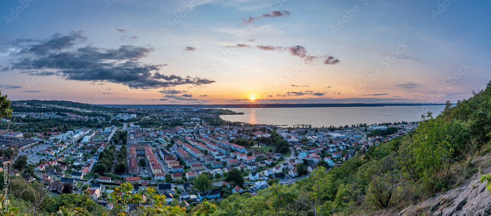 Above Huskvarna city with magical warm reflecting Sunset