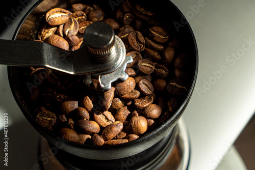 Close Up of a Coffee Grinder morning light in the kitchen gourmet medium dark roast coffee bean