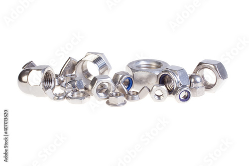 Set of different metal nuts, isolated