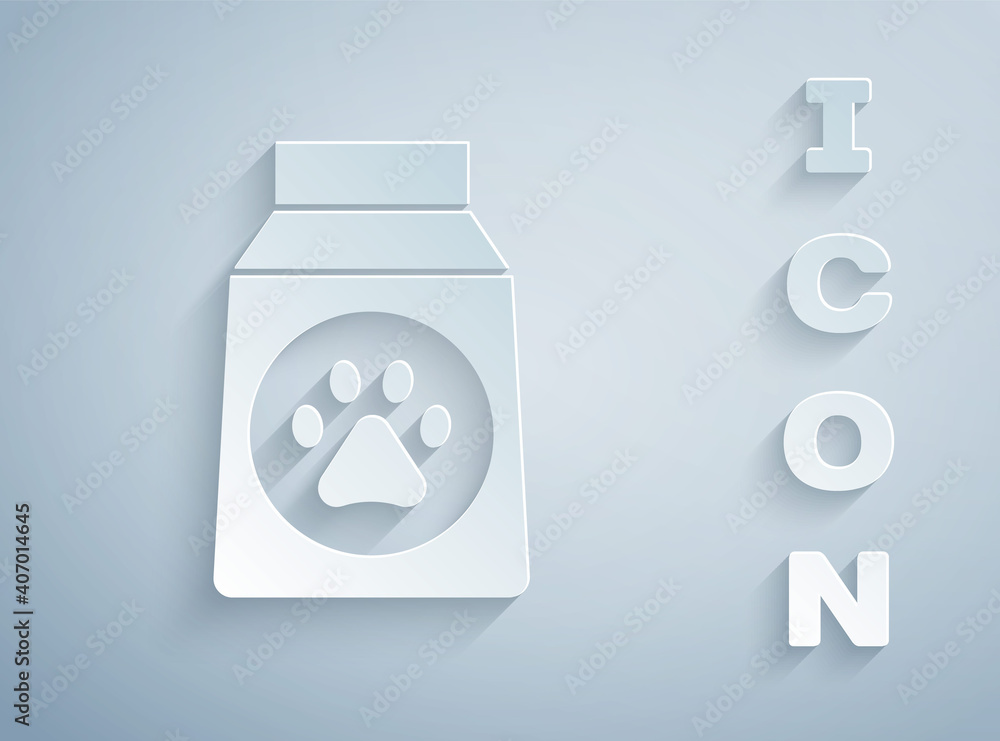 Paper cut Bag of food for dog icon isolated on grey background. Dog or cat paw print. Food for animals. Pet food package. Paper art style. Vector.