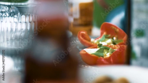 Filled bell peper on a set table on a sunny day looking delicious photo