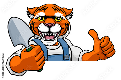 Fototapeta Naklejka Na Ścianę i Meble -  A tiger gardener cartoon gardening animal mascot holding a garden spade tool peeking round a sign and giving a thumbs up