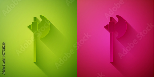 Paper cut Medieval axe icon isolated on green and pink background. Battle axe, executioner axe. Medieval weapon. Paper art style. Vector.