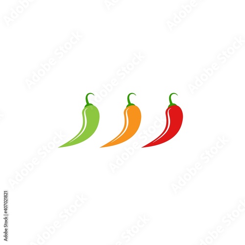 three hot Chili peppers. green, orange and red jalapeno peppers.