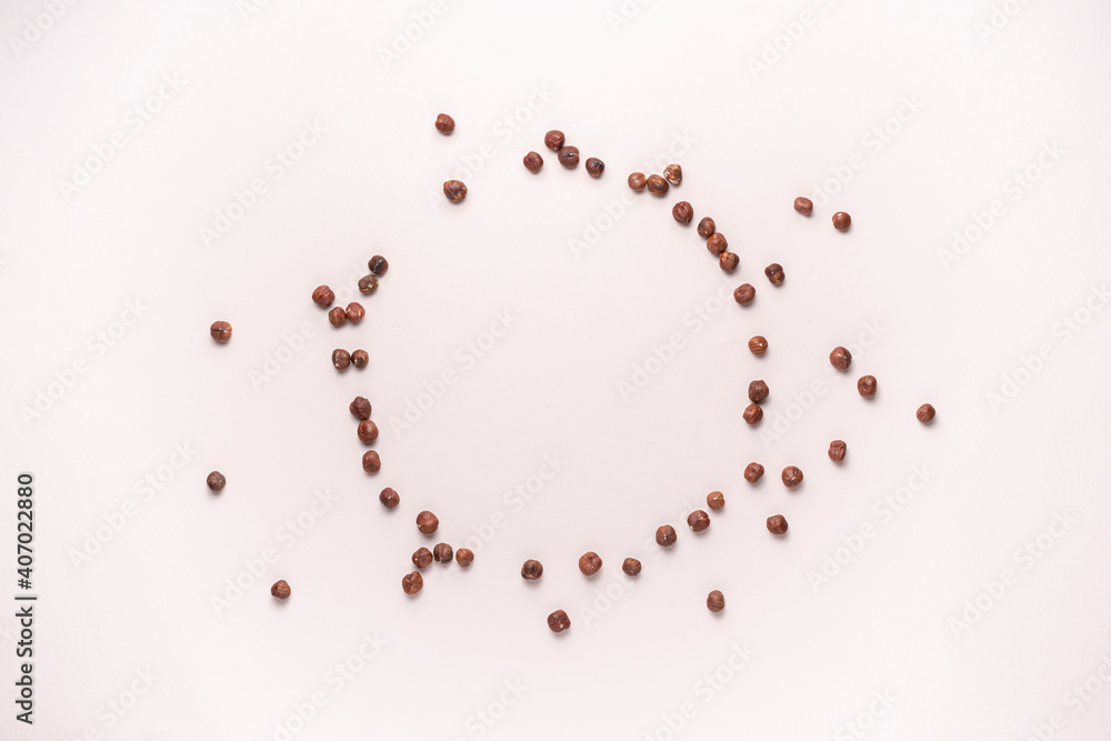 dropped bunch of hazelnut nut without shell flat lay, minimalistic raw food