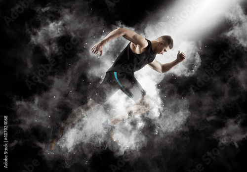 Sporty young man running © Andrey Burmakin