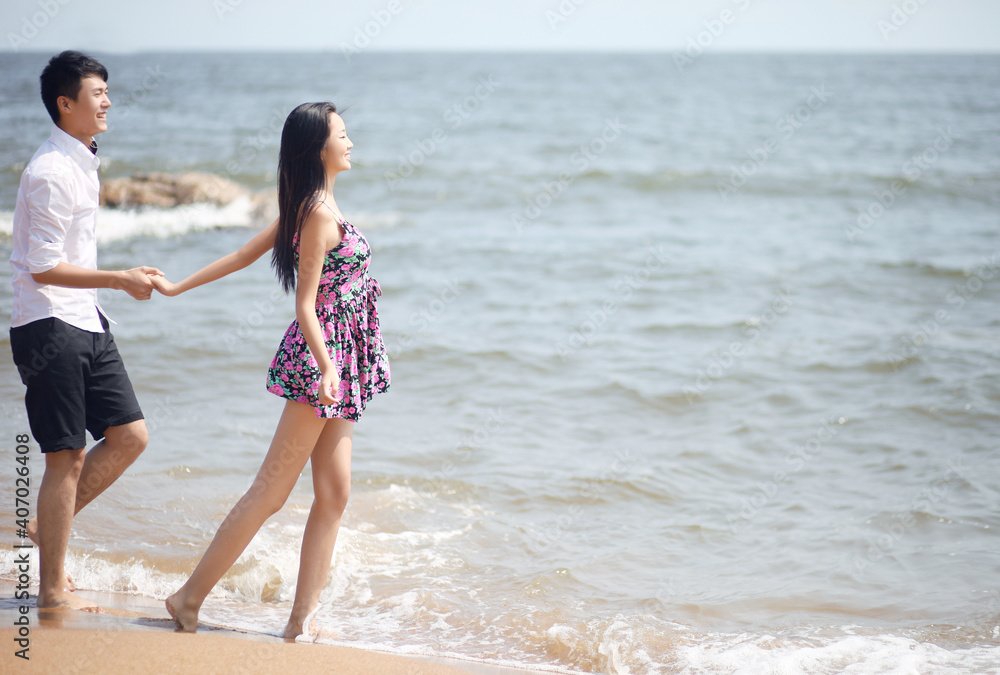 Portrait of a Couple standing on seaside Portrait of a Couple standing on seaside