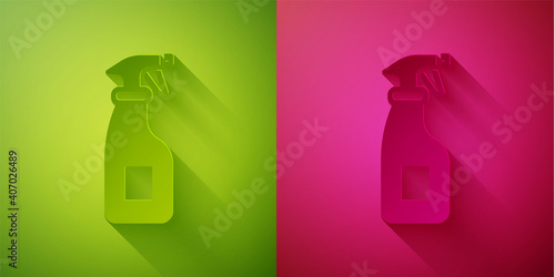 Paper cut Cleaning spray bottle with detergent liquid icon isolated on green and pink background. Paper art style. Vector.