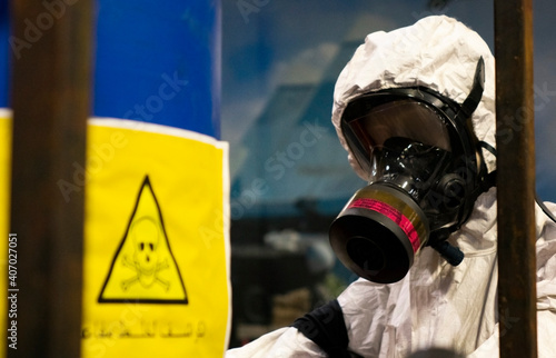 фотографія People in protective suits in the laboratory for the production of chemical and biological weapons