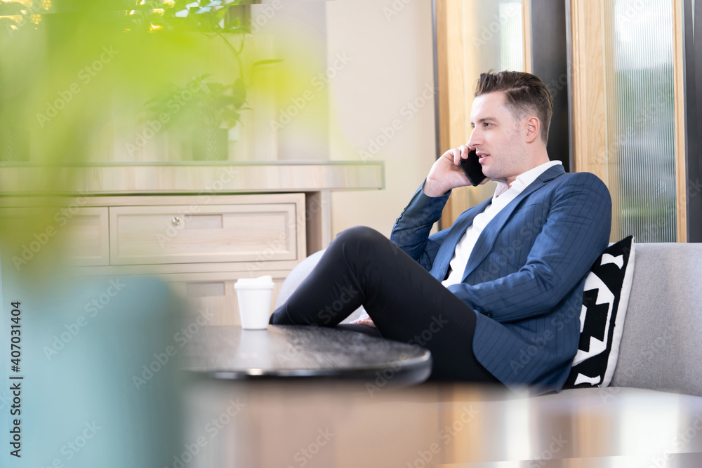 Caucasian Businessman Talking with His Client on the Phone Caucasian Businessman Talking with His Client on the Phone