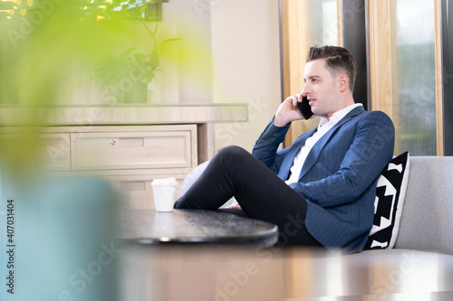 Caucasian Businessman Talking with His Client on the Phone