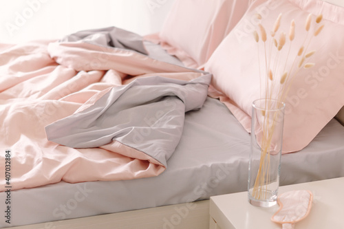 Pink and blue bed linen. Natural