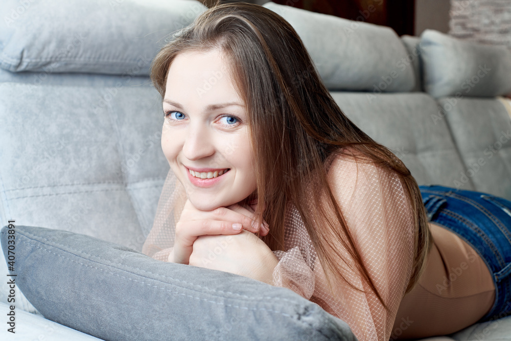 portraits of a girl lying on the sofa relaxed portraits of a girl lying on the sofa relaxed