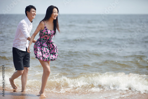 Portrait of a happy Couple on seaside © eastfenceimage
