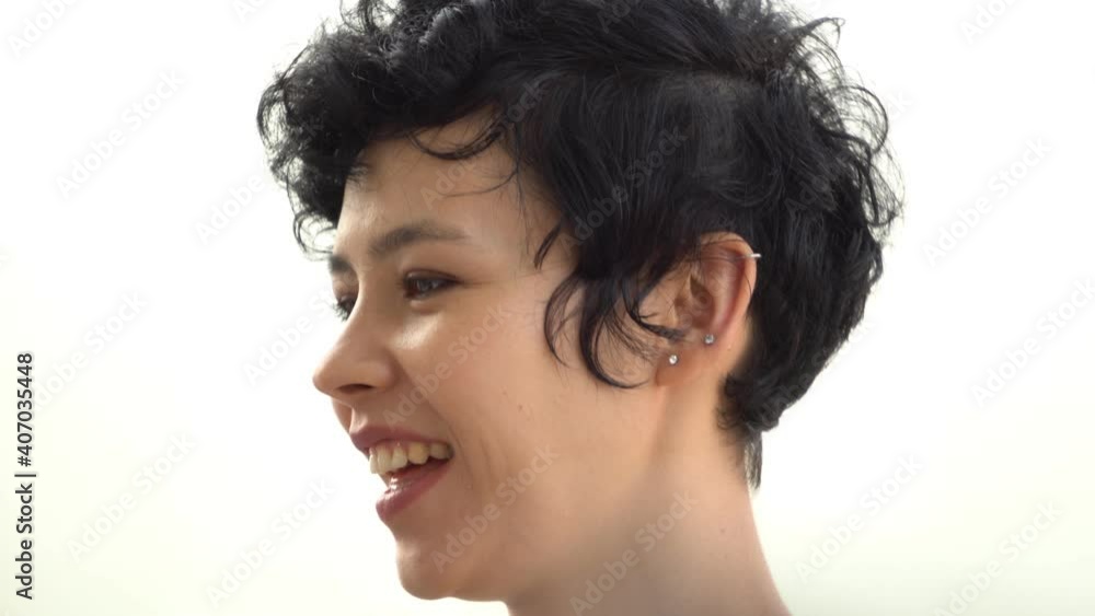 portrait of beautiful young caucasian woman with smiling face and short hair portrait of beautiful young caucasian woman with smiling face and short hair