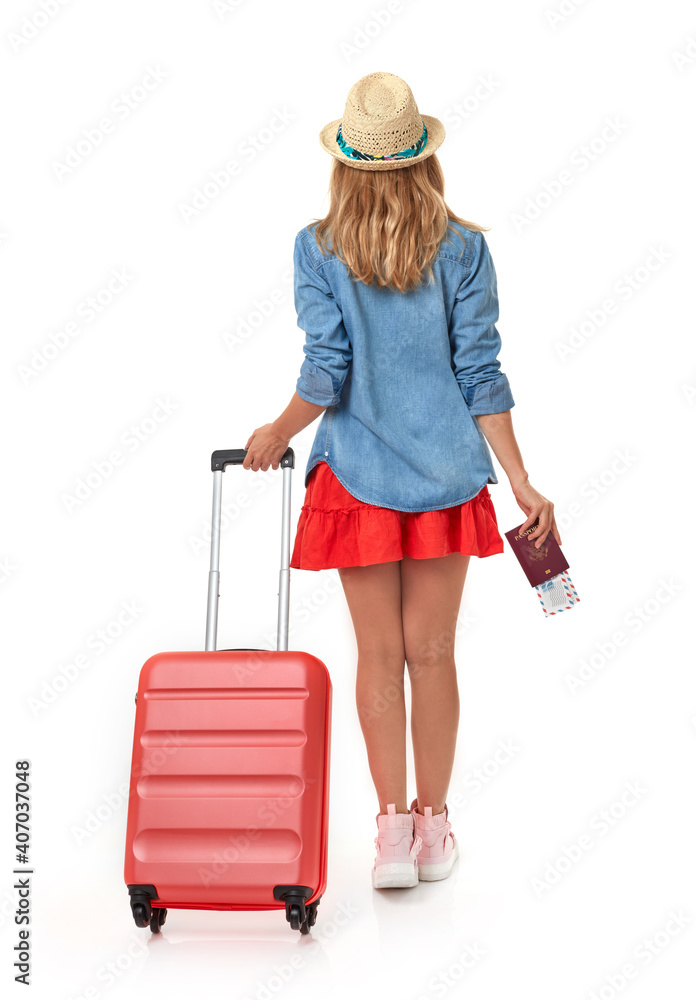 Traveler with suitcase from behind Traveler with suitcase from behind