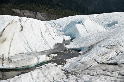 Gletscherschmelze, eine Auswirkung der Erderwärmung und des Klimawandels - Root Gletscher, Alaska photo