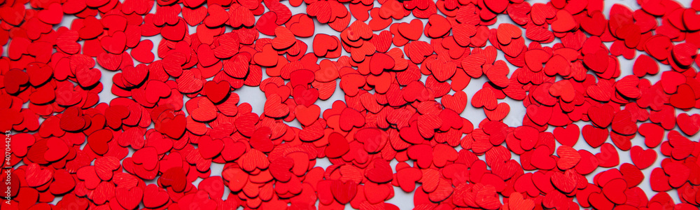 Scattered glitter little red hearts banner. Valentines background Scattered glitter little red hearts banner. Valentines background