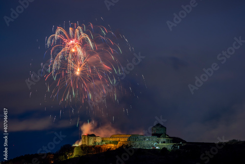 Sparkling explosions on a Fortress named Bohus fortress on New Years photo