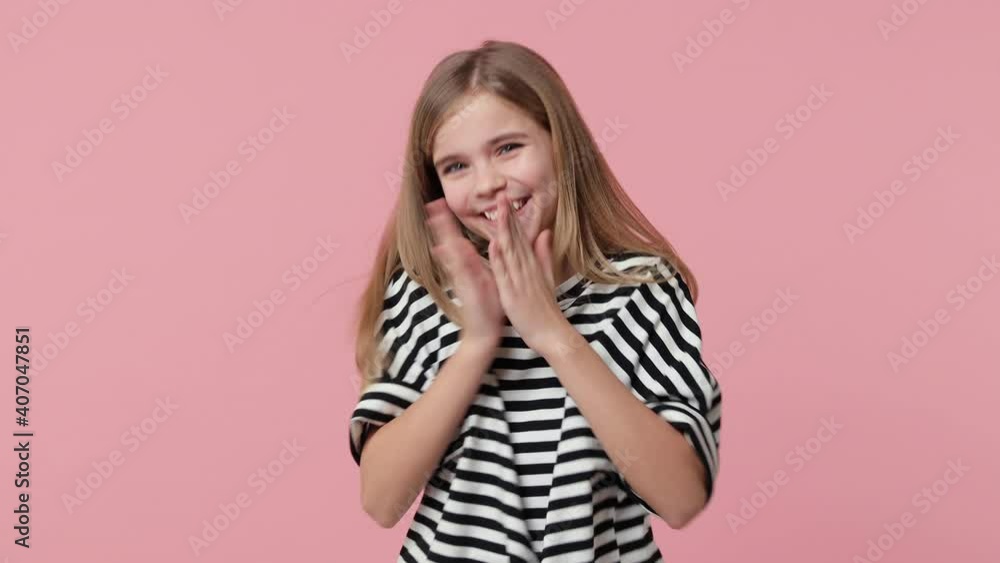 Surprised joyful little kid girl 12-13 in striped t-shirt isolated on pink background studio. Childhood lifestyle concept. Point fingers camera on you hands on herself cheering clapping hands dancing Surprised joyful little kid girl 12-13 in striped t-shirt isolated on pink background studio. Childhood lifestyle concept. Point fingers camera on you hands on herself cheering clapping hands dancing